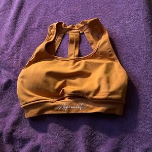 Alphalete Sports Bra in Mustard Yellow